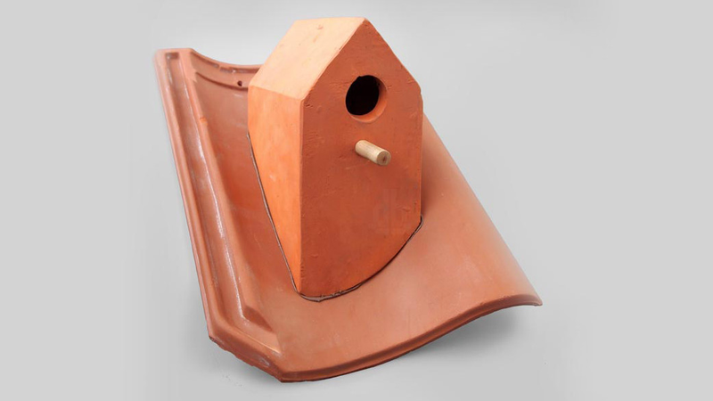 Illustration for article titled This Birdhouse Tile Makes the Most of Your Roof